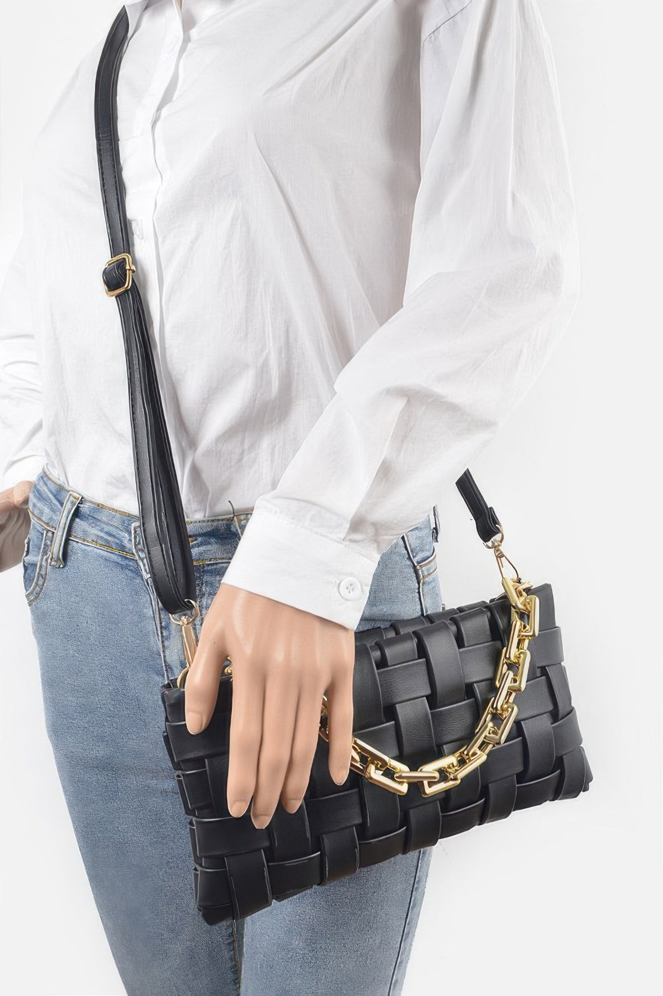 Golden Heir braided chain crossbody bag in black with gold accents, featuring a stylish design and adjustable strap.