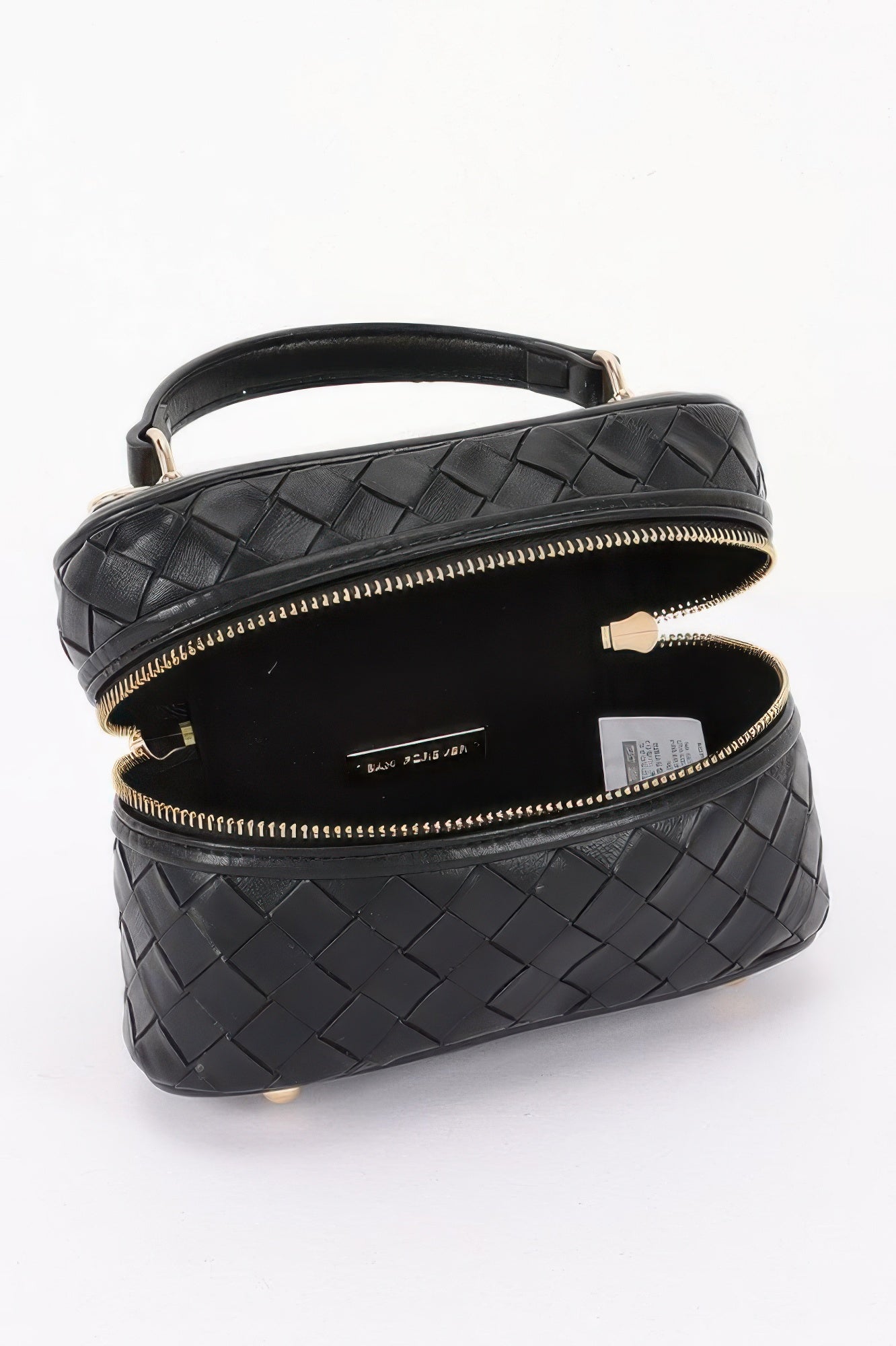 Golden Heir embossed vegan leather crossbody vanity bag in black with gold accents, featuring a sleek, compact design.