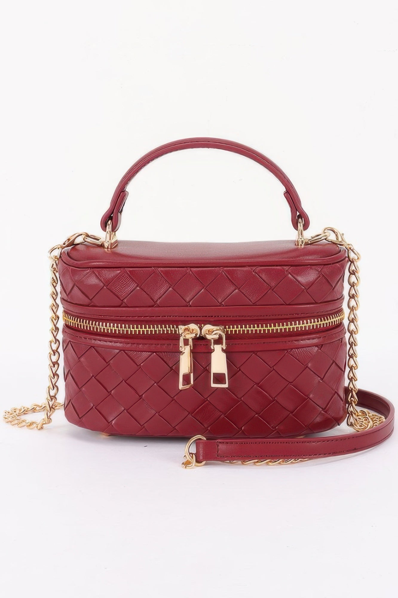 Golden Heir embossed vegan leather crossbody vanity bag in black with gold accents, featuring a sleek, compact design.