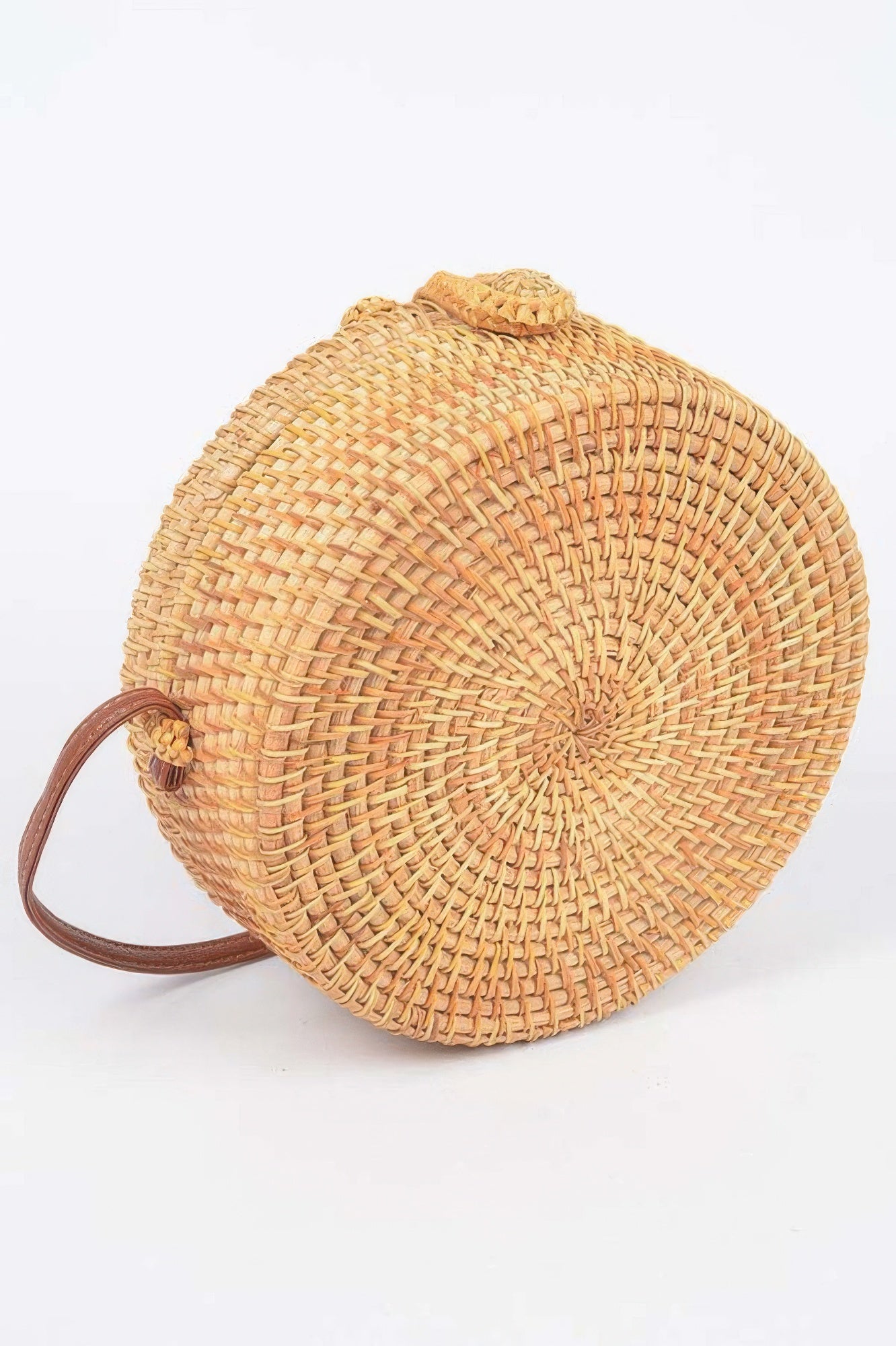 Golden Heir bamboo round crossbody bag with natural finish, featuring a compact, stylish design and adjustable strap.