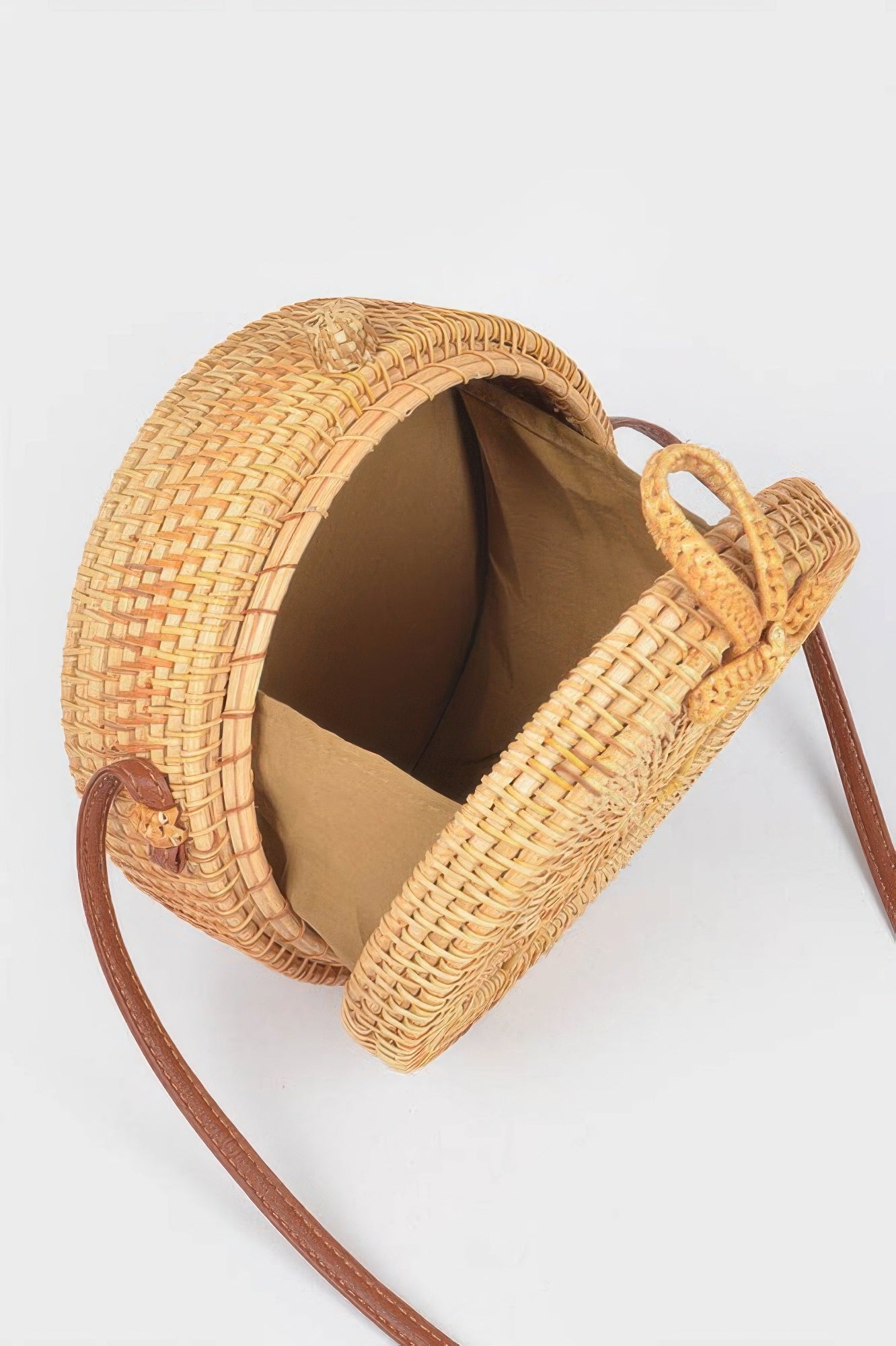 Golden Heir bamboo round crossbody bag with natural finish, stylish and eco-friendly accessory for everyday use.
