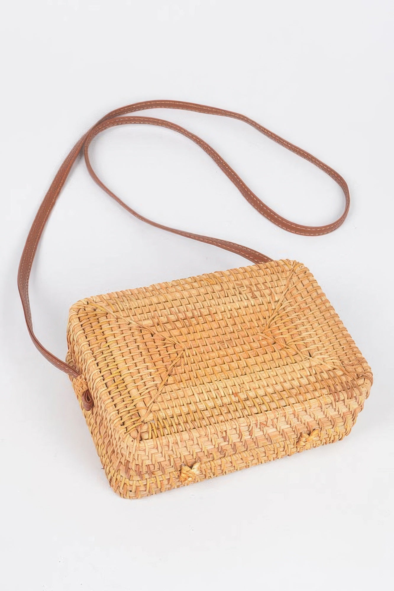 Golden Heir crossbody bamboo box bag with natural finish, stylish and compact accessory for everyday use.