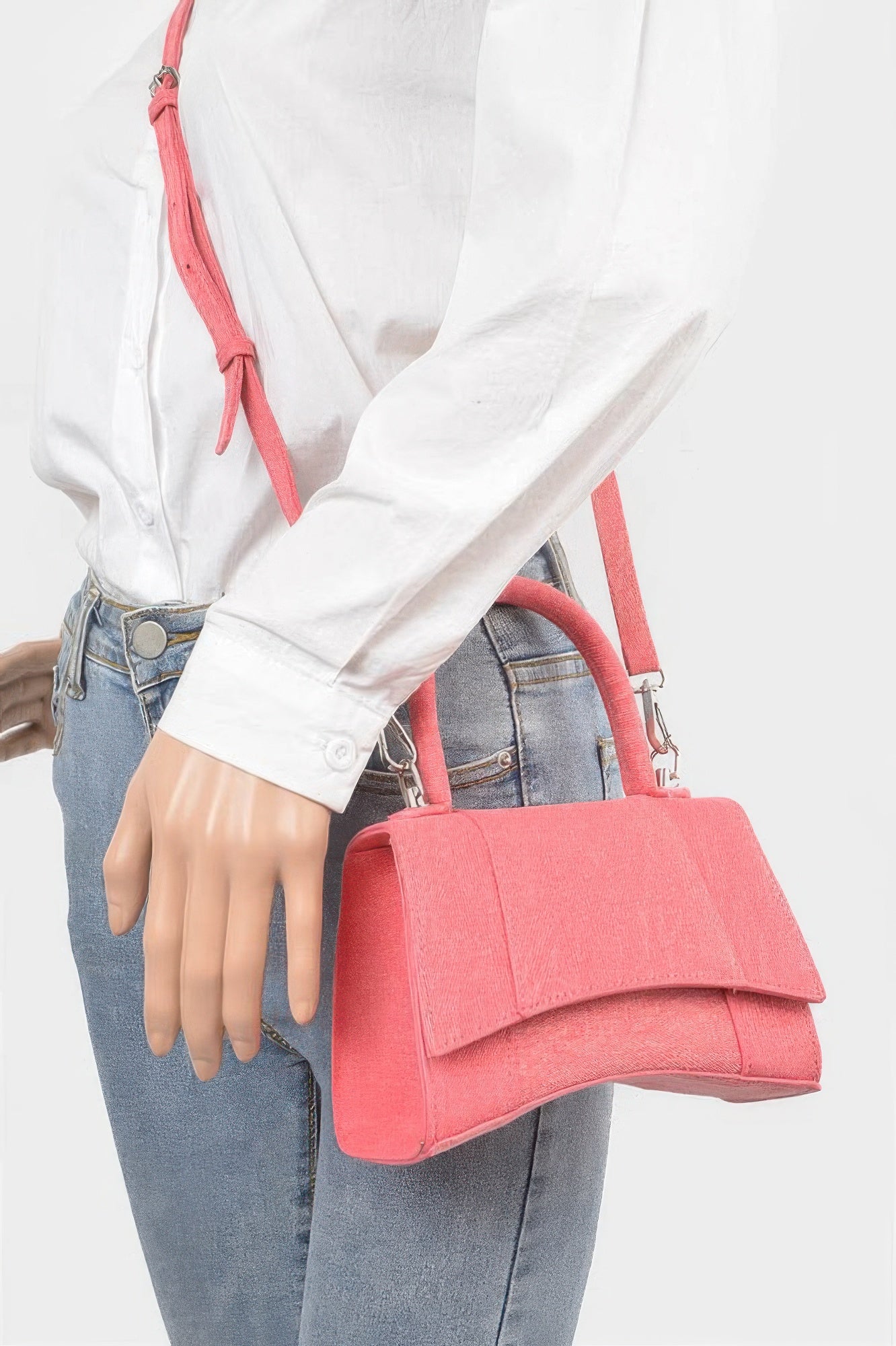 Golden Heir denim crossbody bag with top handle in pink, featuring a stylish and versatile design for everyday use.