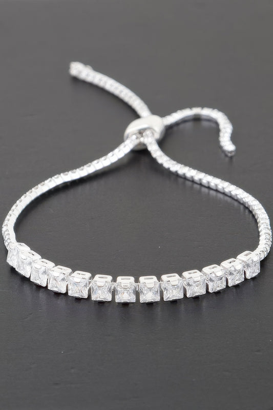 Golden Heir multi cubic jeweled bracelet featuring silver and gold tones with sparkling cubic stones.