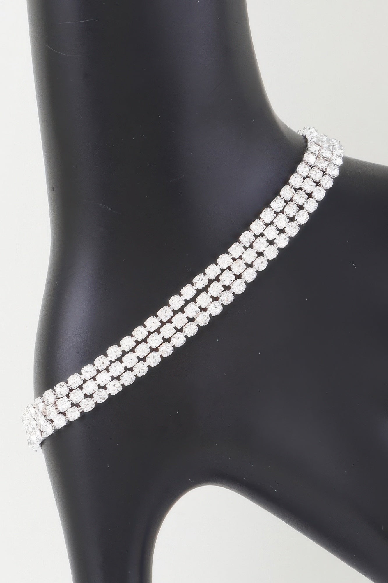 Golden Heir triple cubic jewel bracelet featuring silver and gold-tone cubic accents, elegant and stylish jewelry accessory.