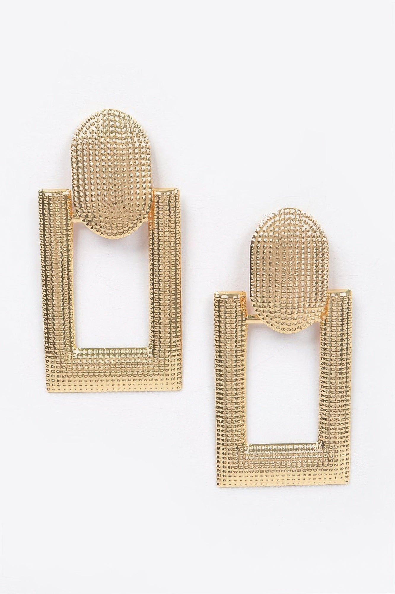 Golden Heir chic gold drop earrings with elegant statement design, showcasing shiny, intricate details for stylish wear.