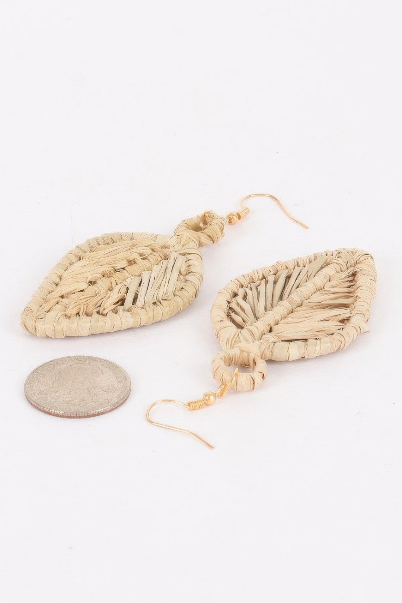 Golden Heir faux straw drop earrings featuring ivory and gold tones, statement jewelry with a bold, stylish design.