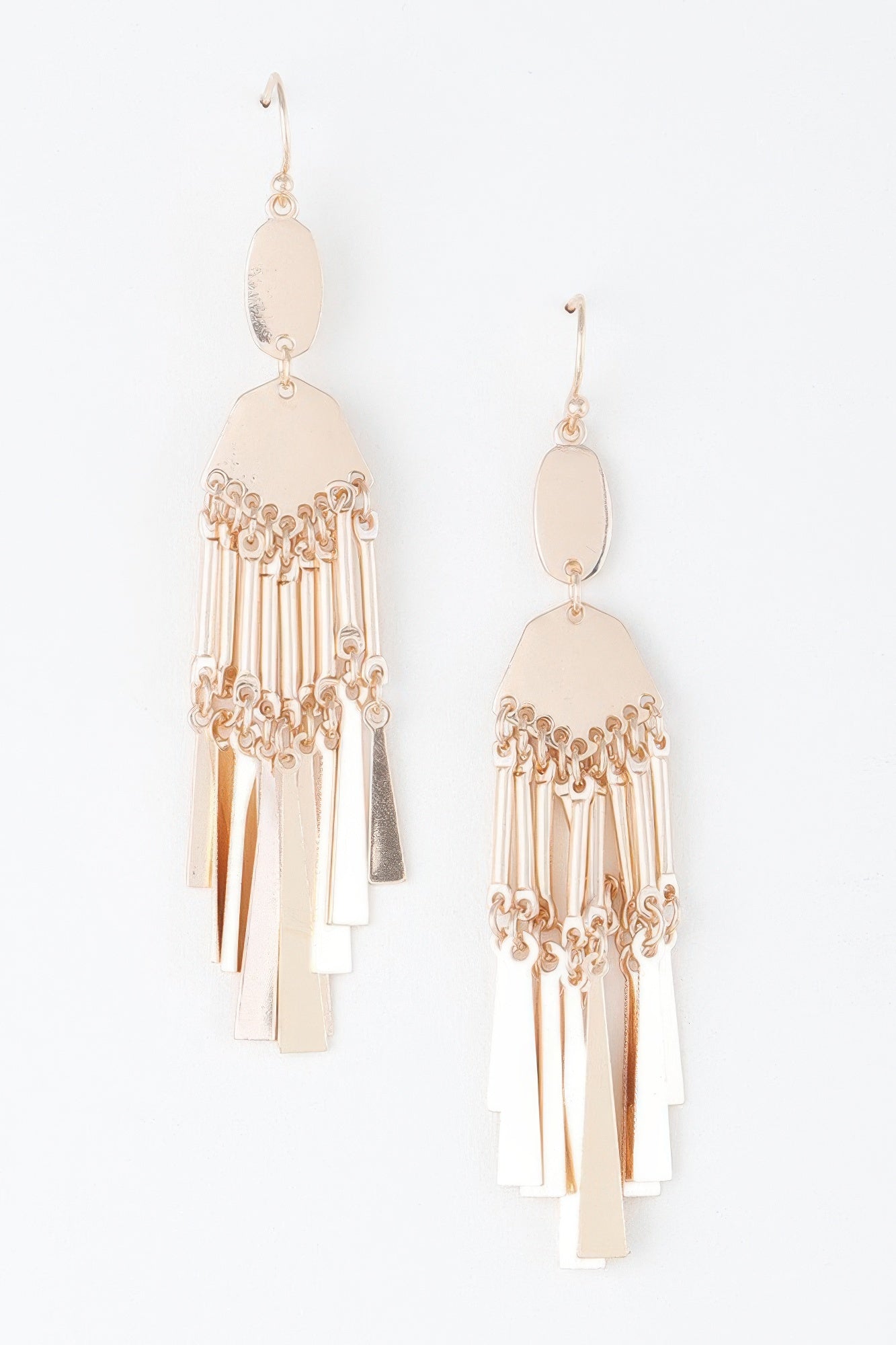 Golden Heir shiny dreamcatcher drop earrings featuring gold and silver accents, hanging delicately for a stylish look.