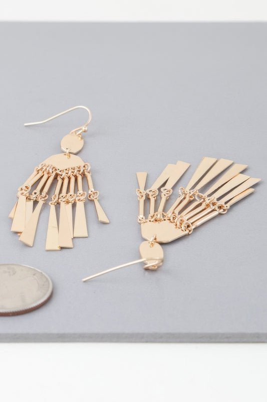 Golden Heir shiny dreamcatcher drop earrings with intricate golden and silver details, hanging elegantly.