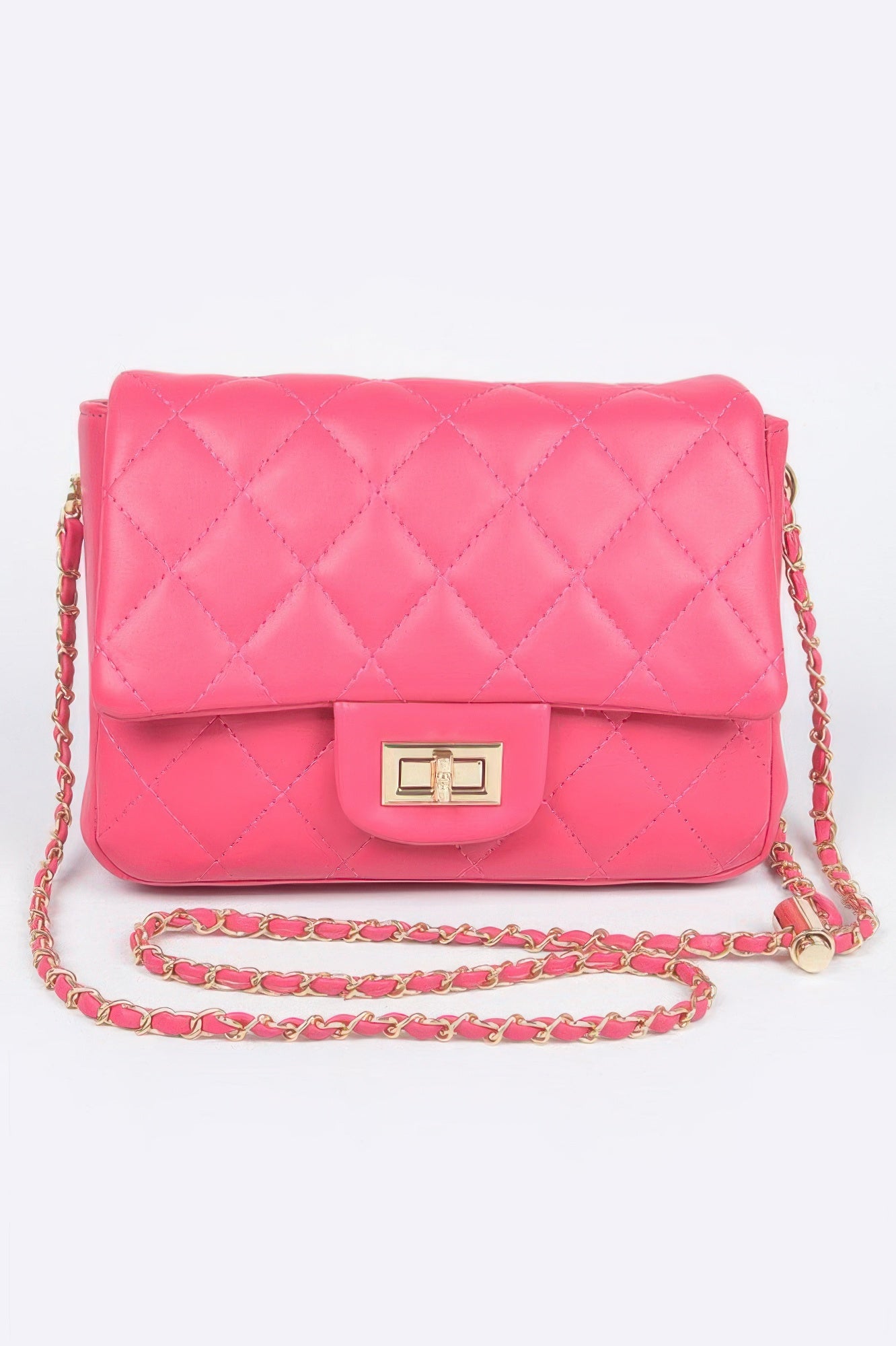 Golden Heir quilted faux leather flap bag in nude color, featuring a stylish design with a flap closure and gold-tone accents.