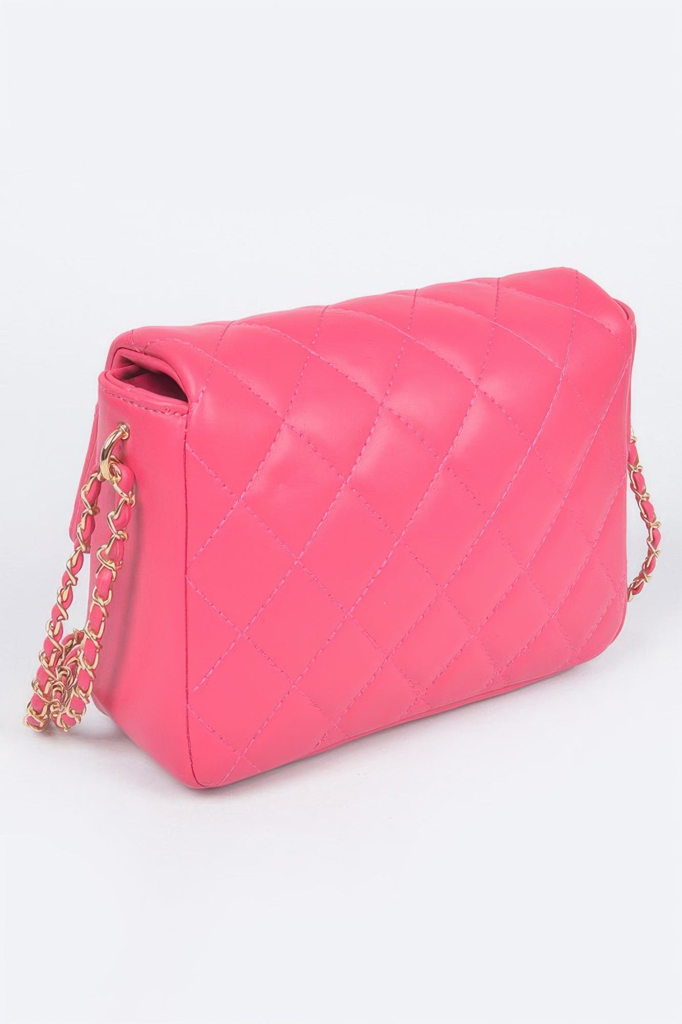 Golden Heir quilted faux leather flap bag in nude color with a stylish design and gold-tone hardware.