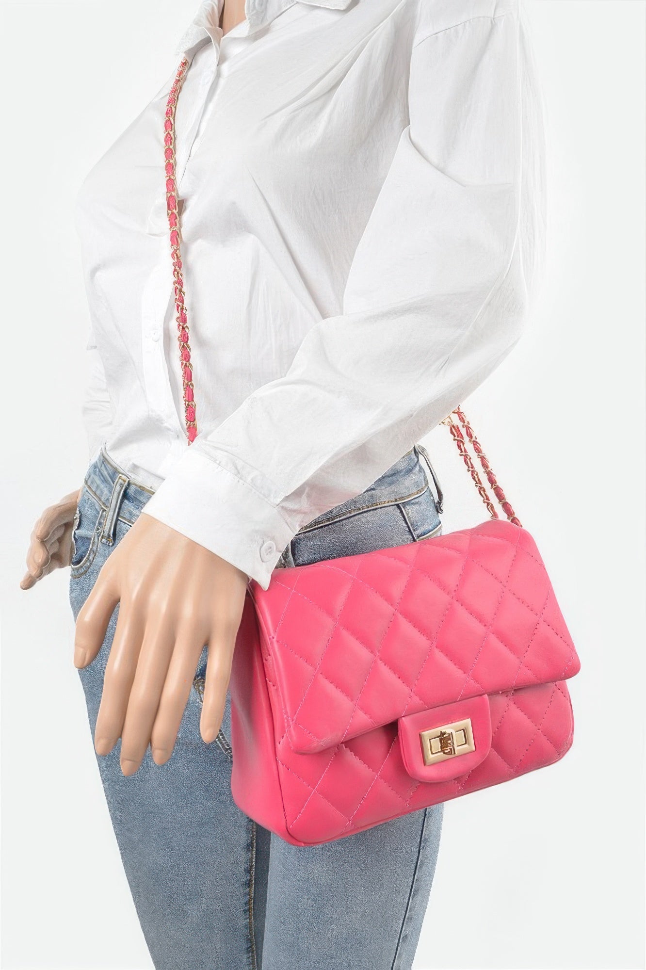 Golden Heir quilted faux leather flap bag in nude color, featuring a structured design and gold-tone hardware.