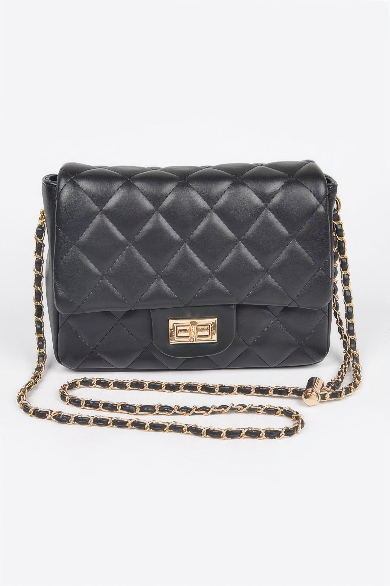 Golden Heir quilted faux leather flap bag in nude color with gold-tone hardware and a stylish, padded design.