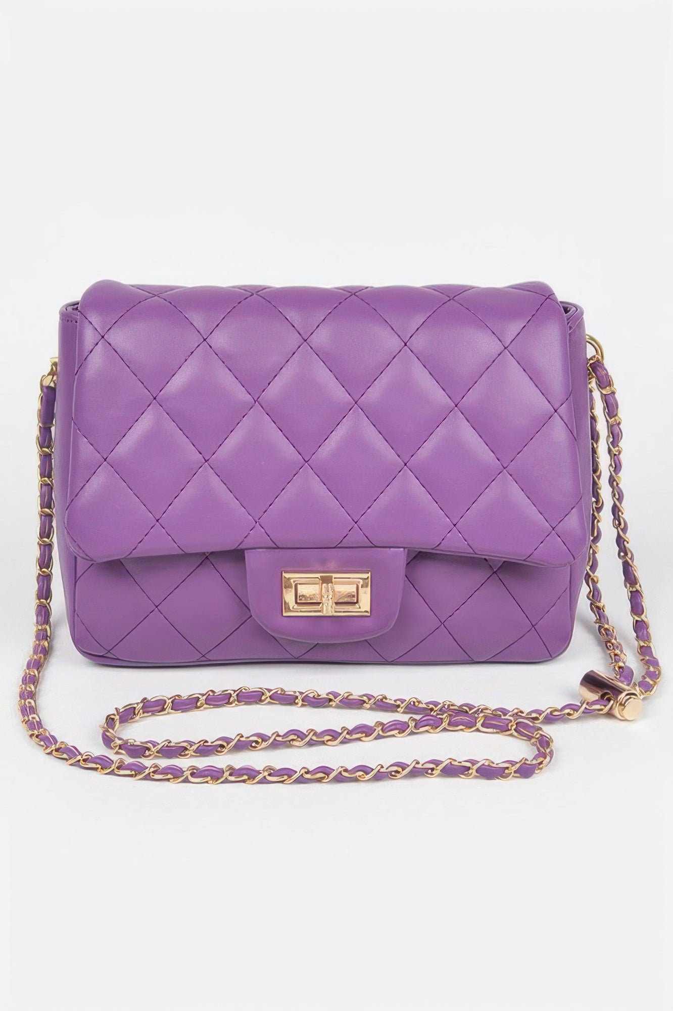 Golden Heir quilted faux leather flap bag in nude color, showcasing a stylish design with a top flap closure and gold accents.