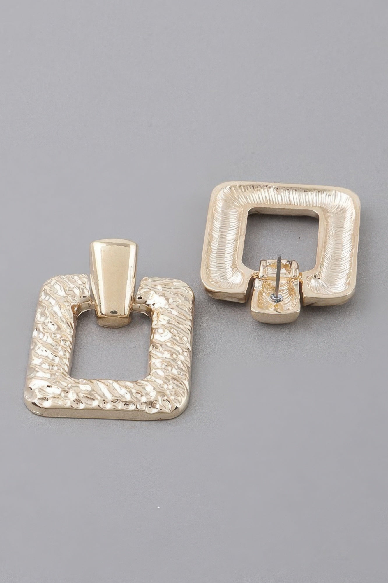 Golden Heir multi-shape gold arch drop earrings with geometric design and lightweight style, perfect for elegant wear.