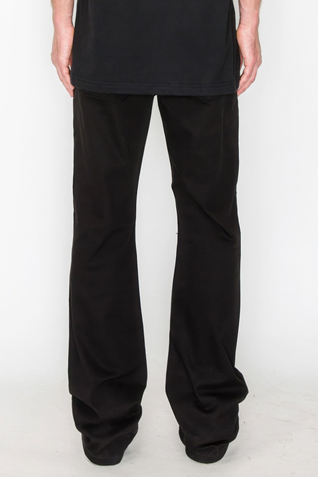 Golden Heir bootcut colored jeans with ripped and repaired details, showcasing trendy denim style and vibrant color.