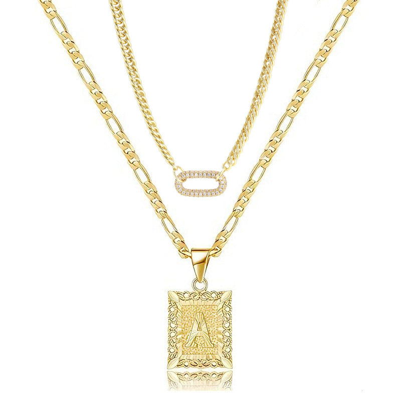 Golden Heir double-layer gold necklace with 26 letter charms and zircon circle accents, showcasing elegant jewelry design.