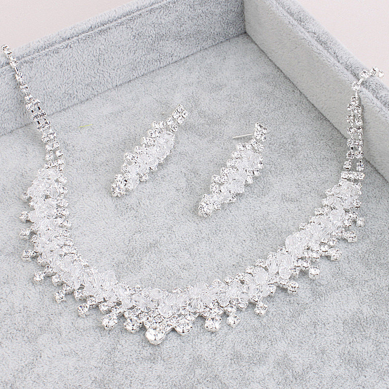 Golden Heir wedding jewelry set featuring a elegant crown and matching pieces for bridal adornment.