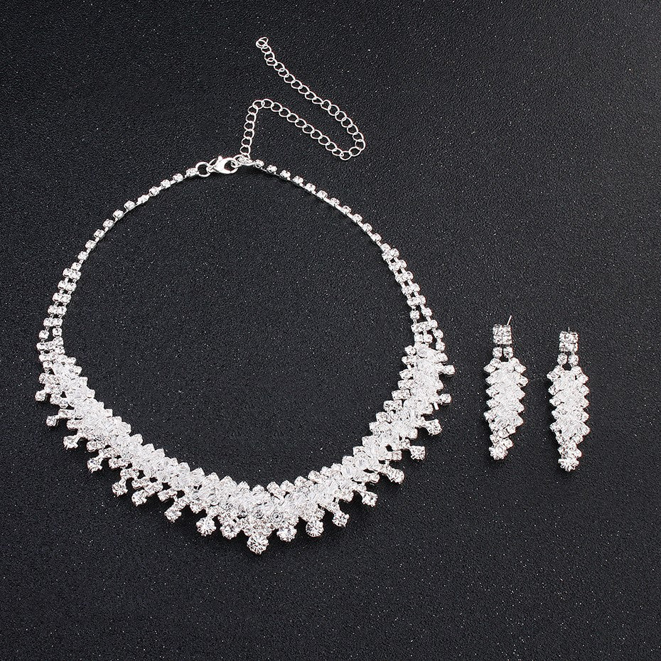 Golden Heir wedding jewelry set featuring a gold crown and matching accessories, elegant jewelry for special occasions