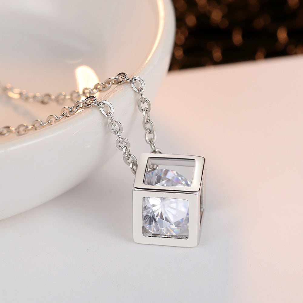 Golden Heir Water Cube Zircon Jewelry Set featuring a gold necklace and matching earrings with sparkling zircon stones