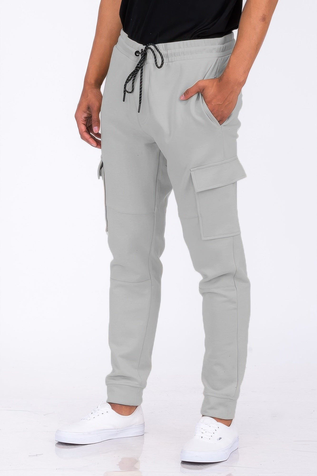 Black Golden Heir cargo jogger sweats with relaxed fit, featuring multiple pockets and comfortable elastic waistband.