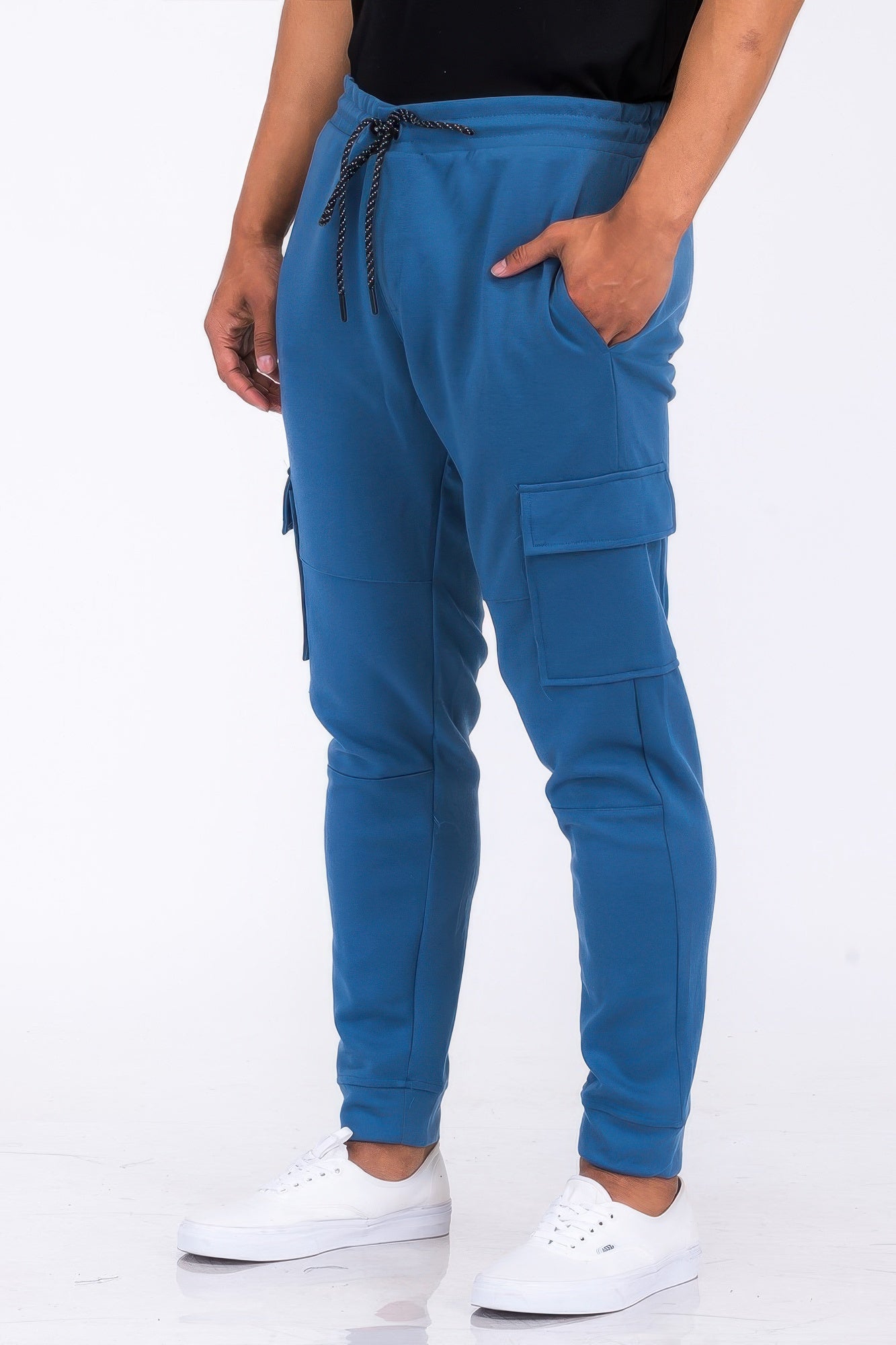 Black Golden Heir cargo jogger pants with relaxed fit, featuring multiple pockets and comfortable elastic waistband.