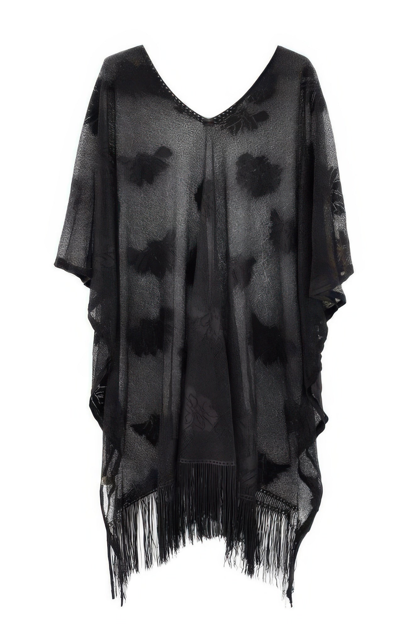 Black floral lace tassel poncho by Golden Heir, lightweight lace poncho with intricate floral design and tassel details.