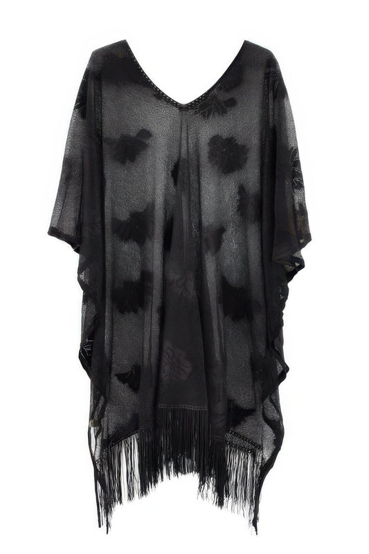 Black floral lace tassel poncho by Golden Heir, lightweight lace poncho with intricate floral design and tassel details.