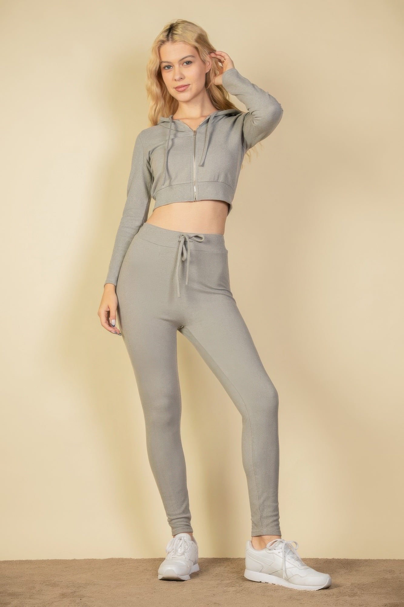 Black Golden Heir tie-front ribbed lounge leggings laid flat, showing the high-waist design and ribbed texture for comfortable wear.