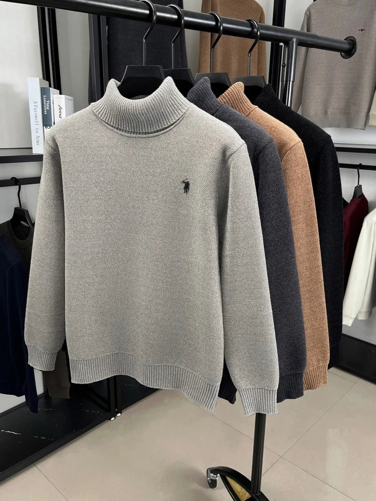 Black Golden Heir men's long sleeve top with a sleek, elevated design and subtle branding, shown on a mannequin.