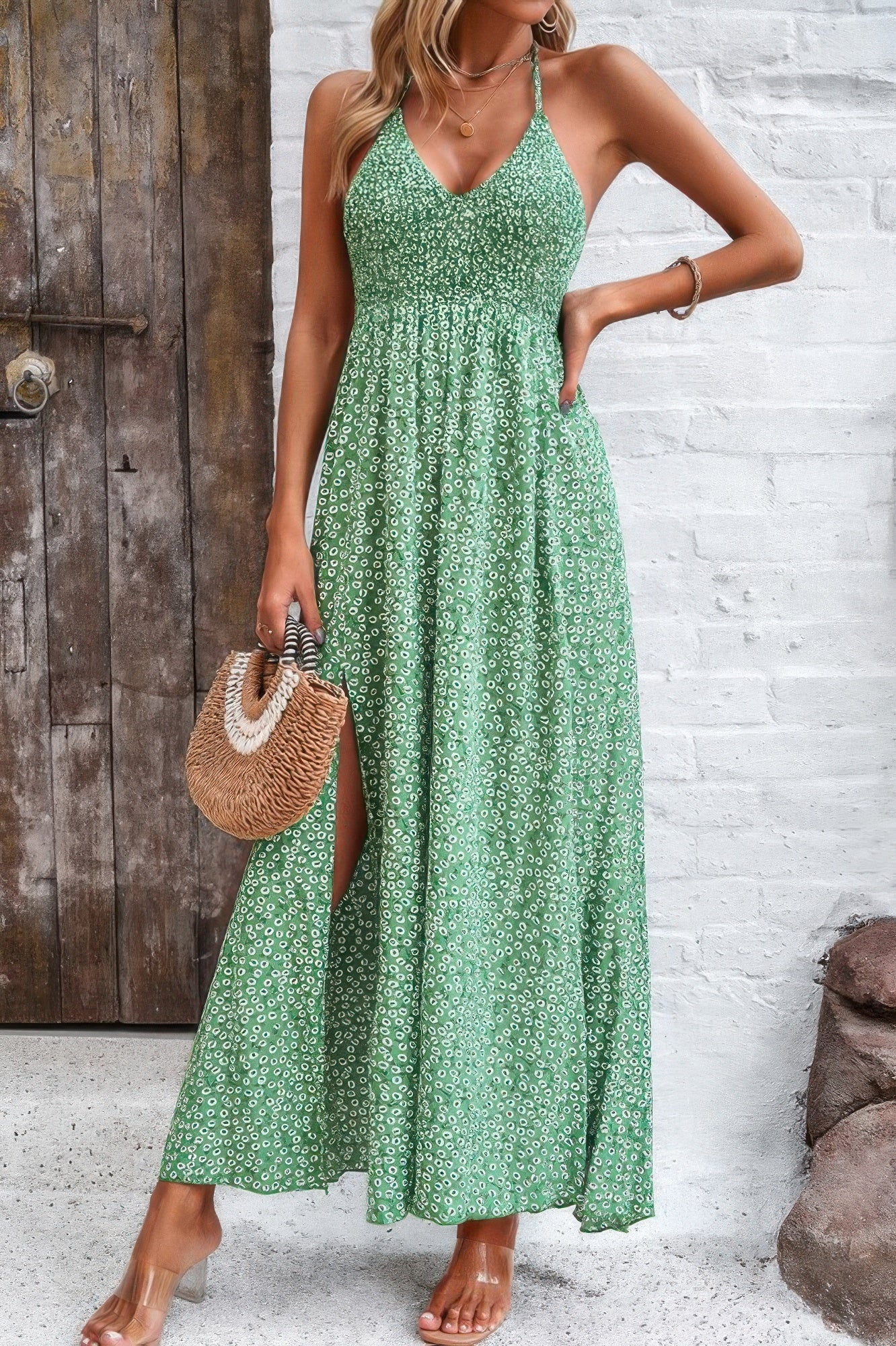 Golden Heir floral boho sleeveless maxi dress with tie waist and high waist design, featuring a vibrant blue and gold pattern.