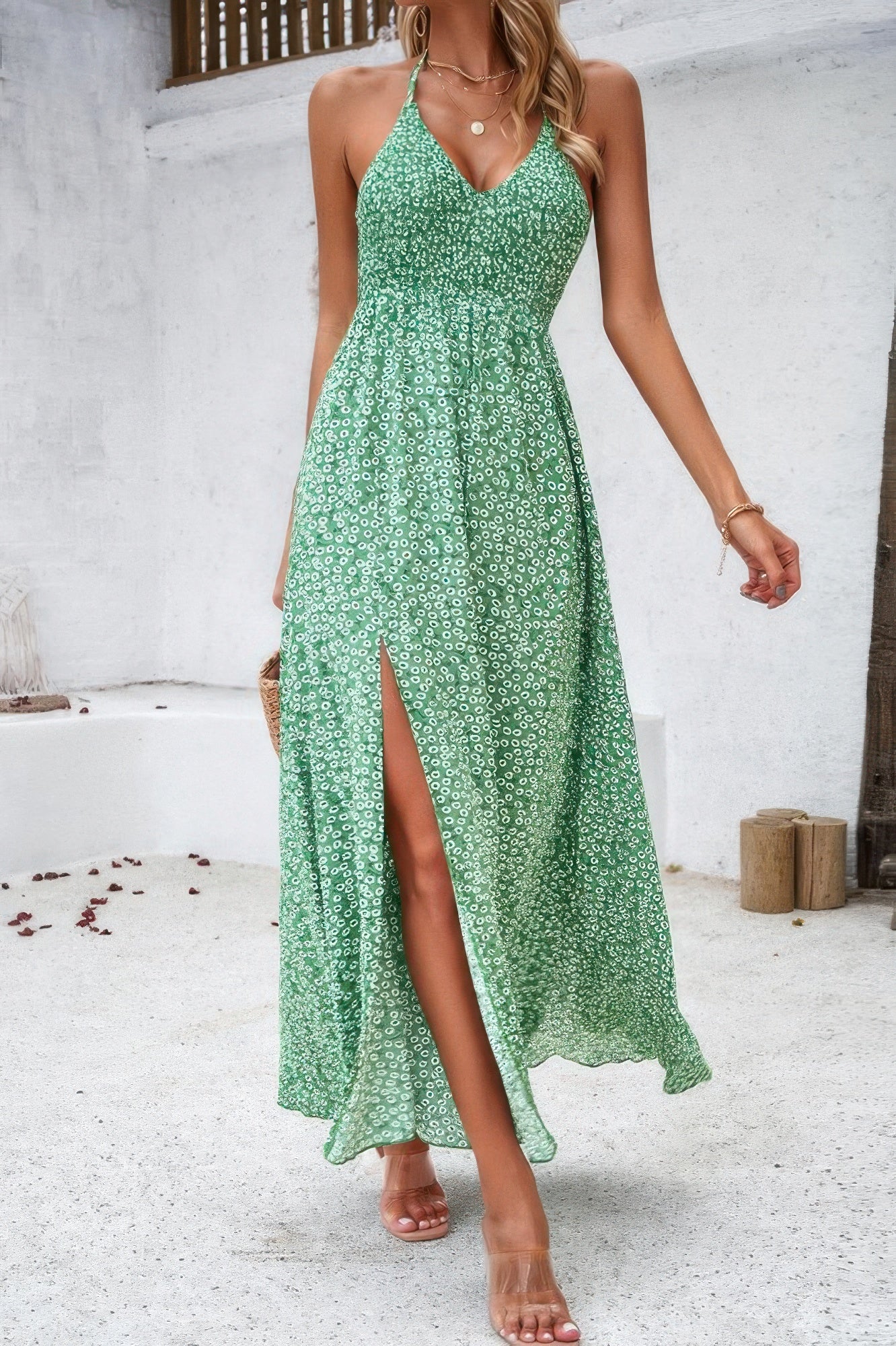 Golden Heir floral boho sleeveless maxi dress with high waist, tie detail and vibrant blue and gold pattern.