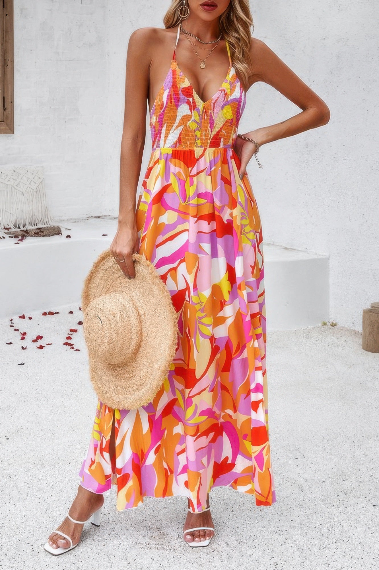 Golden Heir floral boho sleeveless maxi dress with tie waist, high-waist design and vibrant blue and gold print.