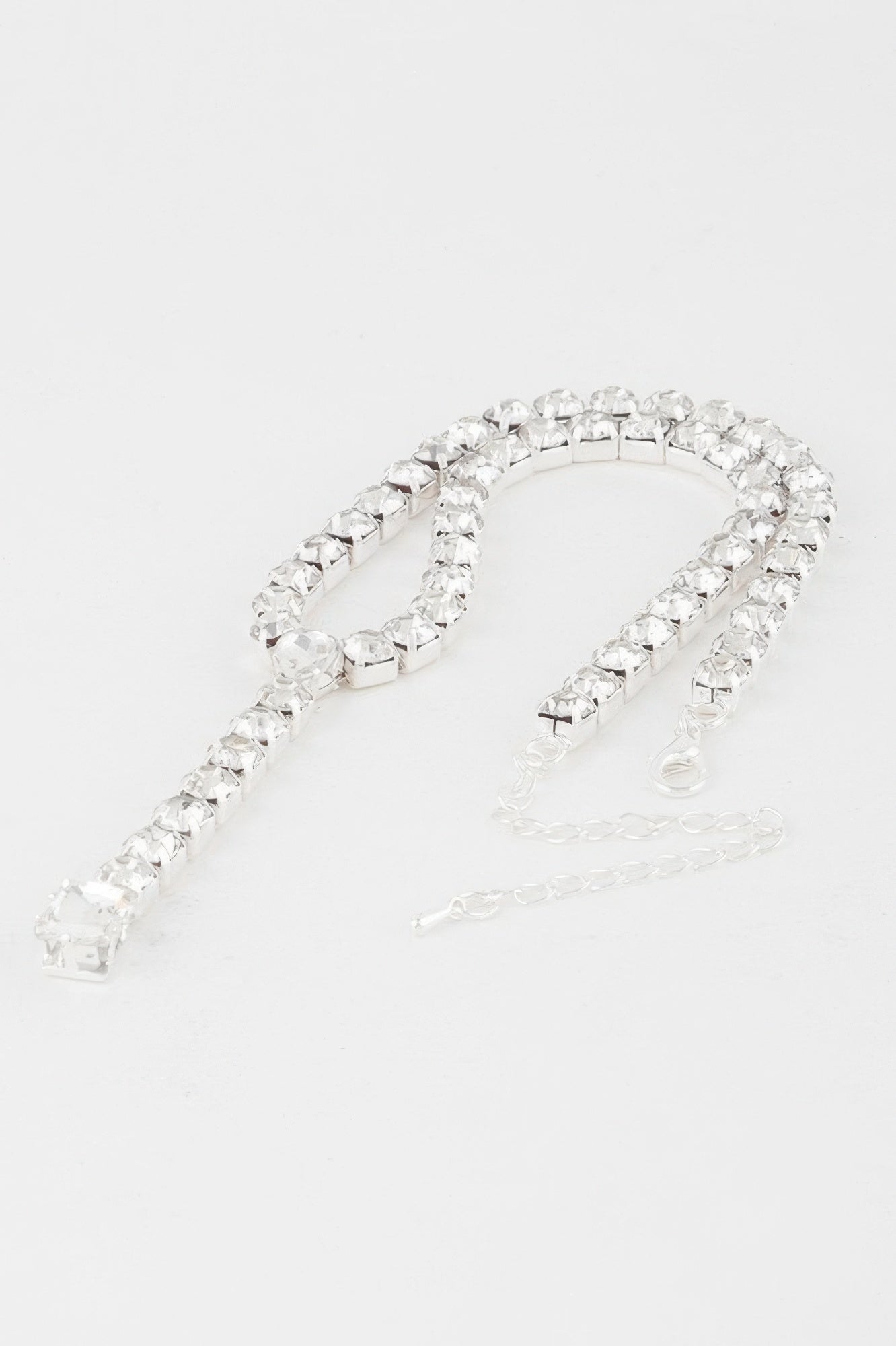 Golden Heir Dipped In Fancy Y Necklace featuring a gold chain with clear accents, showcasing elegant jewelry design.