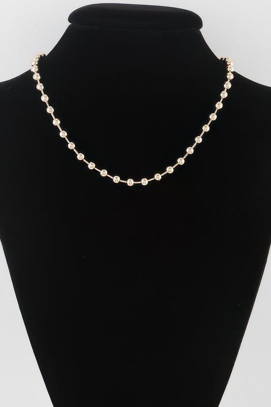 Golden Heir metal ball beaded short necklace with gold-toned beads, stylish and elegant jewelry accessory.