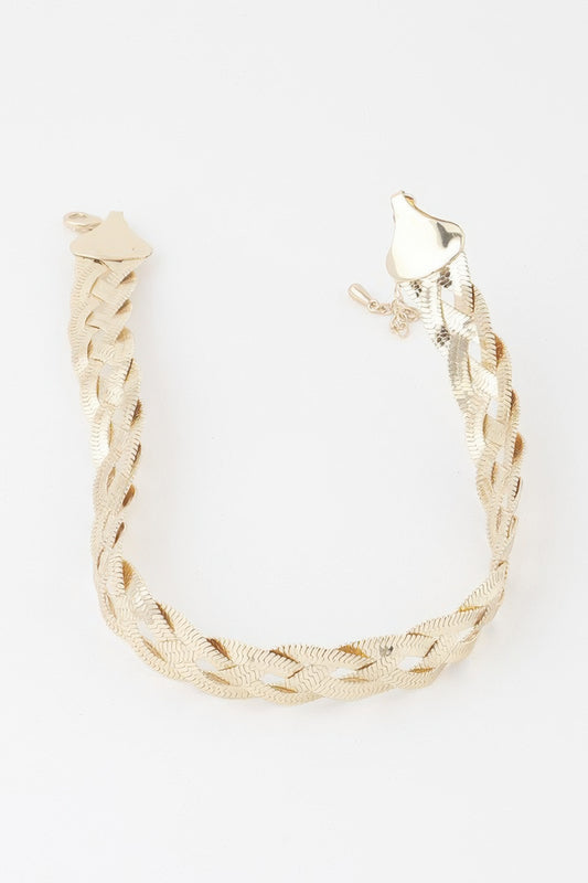 Golden Heir triple braid snake chain necklace in shiny gold, showcasing its smooth, twisted design and sleek finish.