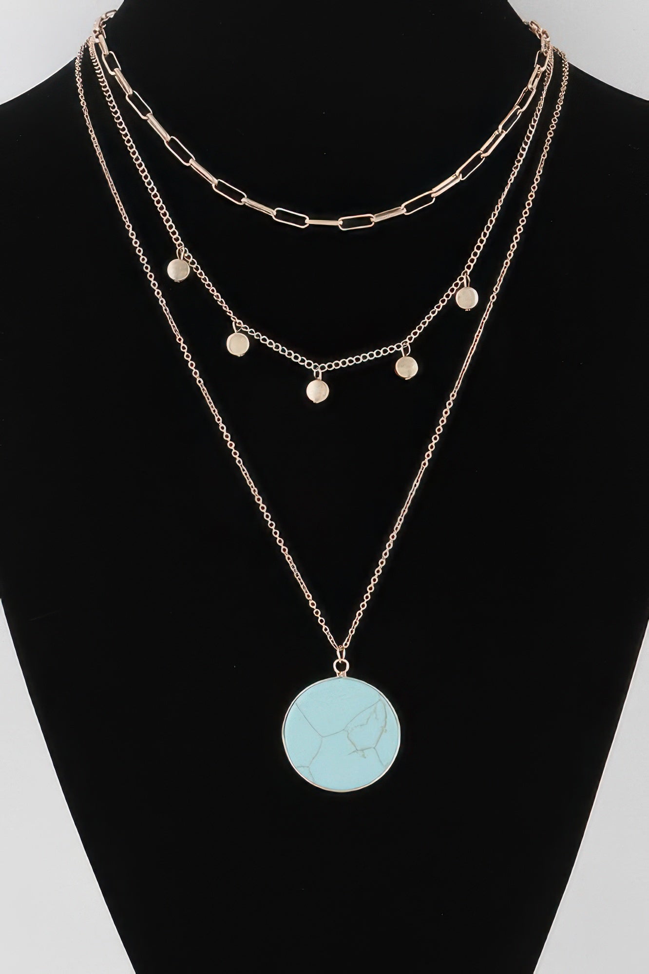 Golden Heir multi-stone pendant chain necklace with gold and turquoise stones, elegant jewelry accessory.