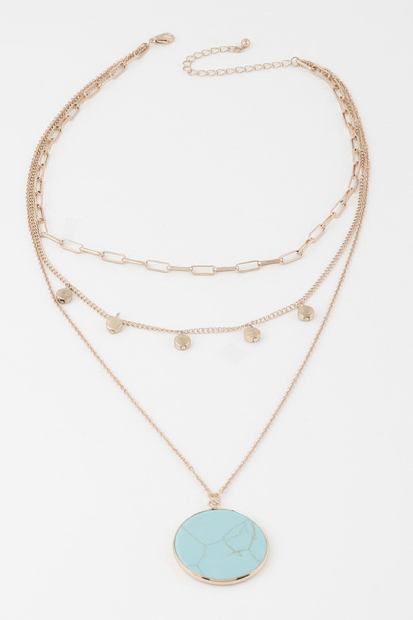 Golden Heir multi-stone pendant chain necklace featuring gold and turquoise stones, elegant jewelry for stylish adornment.