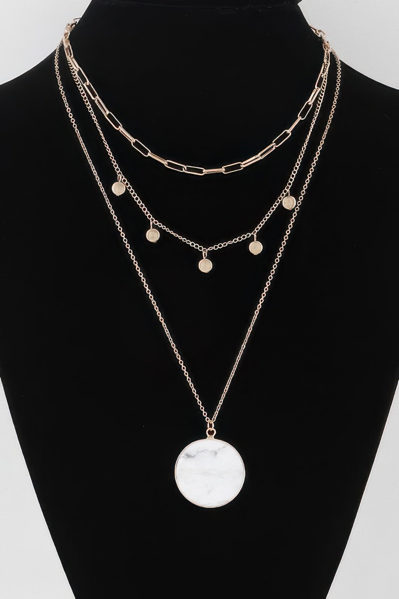 Golden Heir multi-stone pendant chain necklace featuring gold and turquoise stones on a delicate chain.