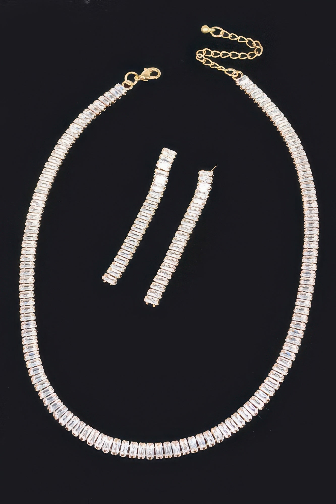 Golden Heir Aetheris stone necklace set featuring clear gold-toned jewelry with intricate detailing and elegant design.