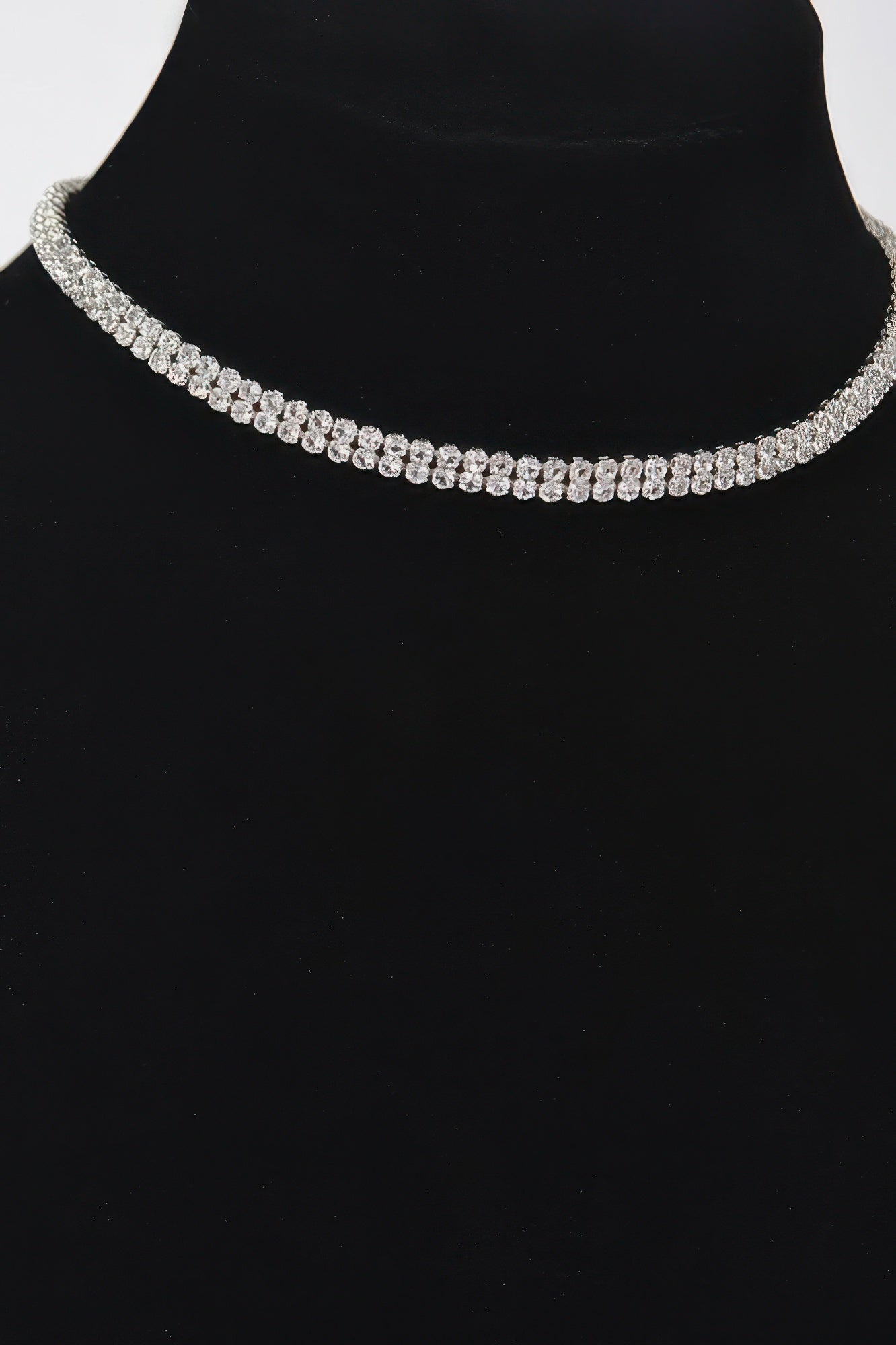 Golden Heir shiny minimal choker necklace featuring a sleek gold design, close-up view of the elegant jewelry piece.
