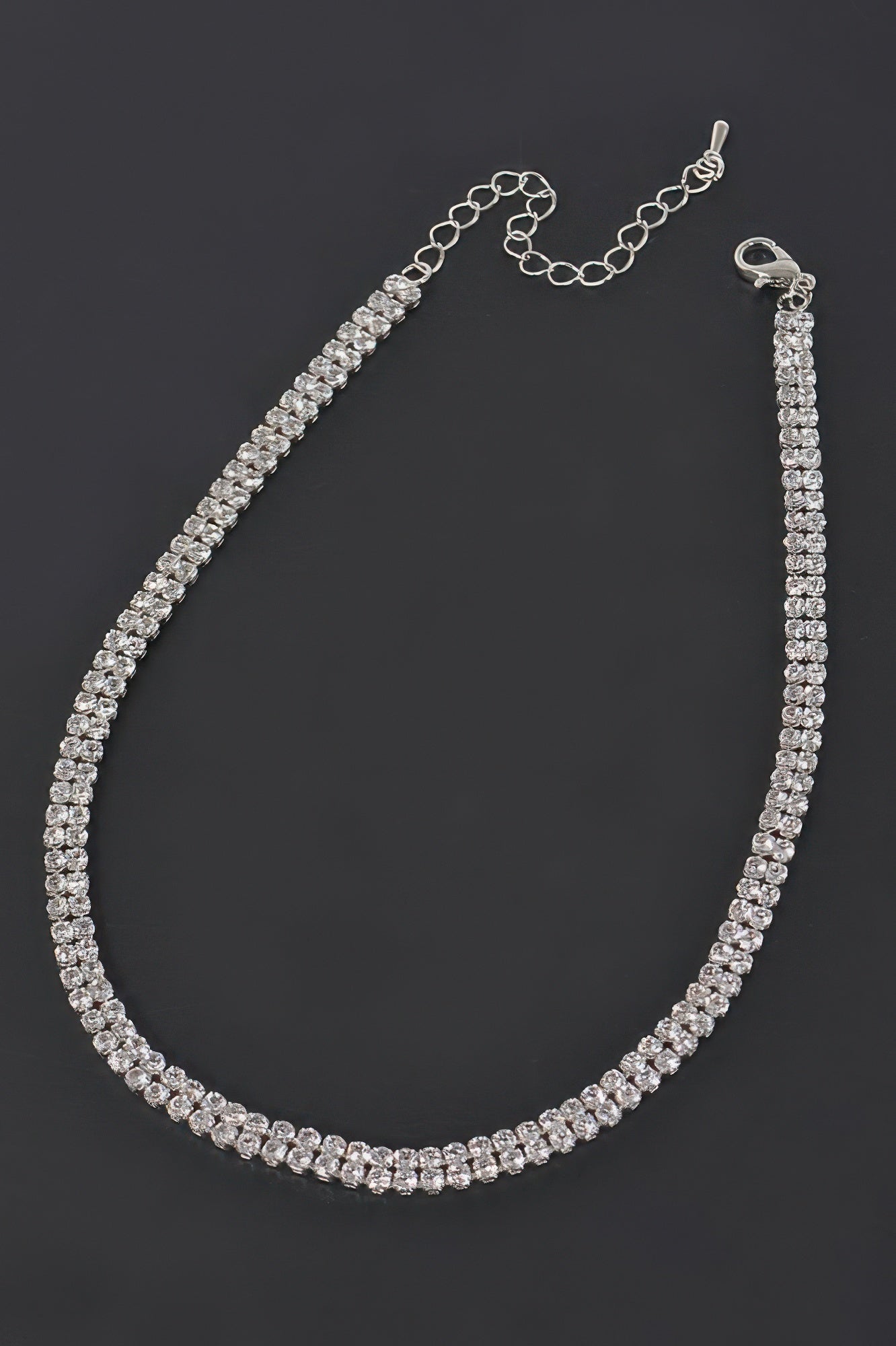 Golden Heir shiny minimal choker necklace showcasing a sleek gold design with a smooth, elegant finish.