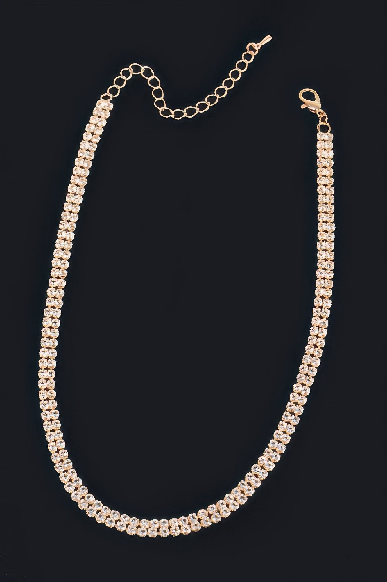 Golden Heir shiny minimal choker necklace in gold finish, close-up view showing sleek, elegant jewelry design.