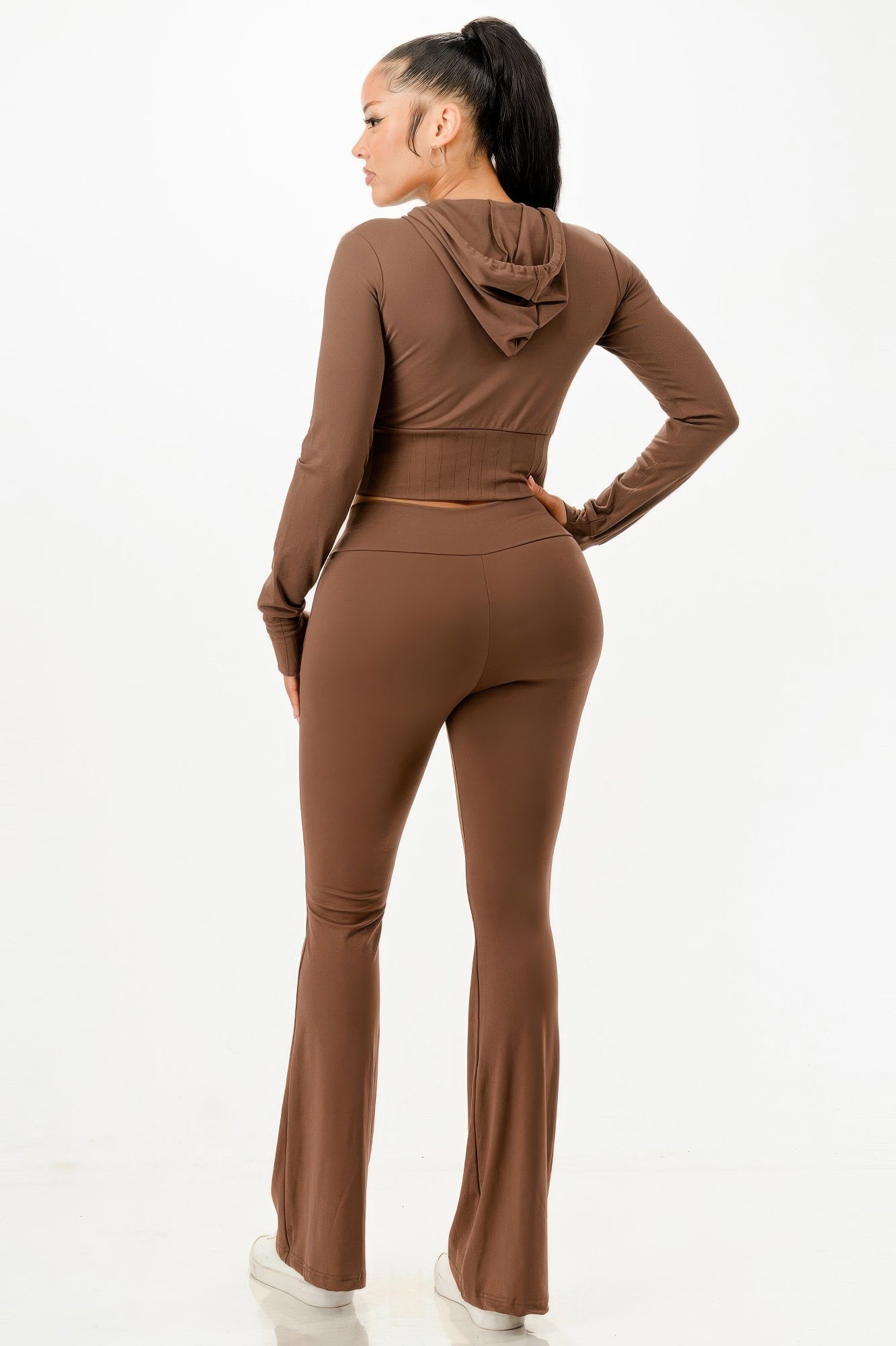Golden Heir outfit set featuring a butter-soft crop hoodie and matching flare pants, styled for a casual, comfortable look.