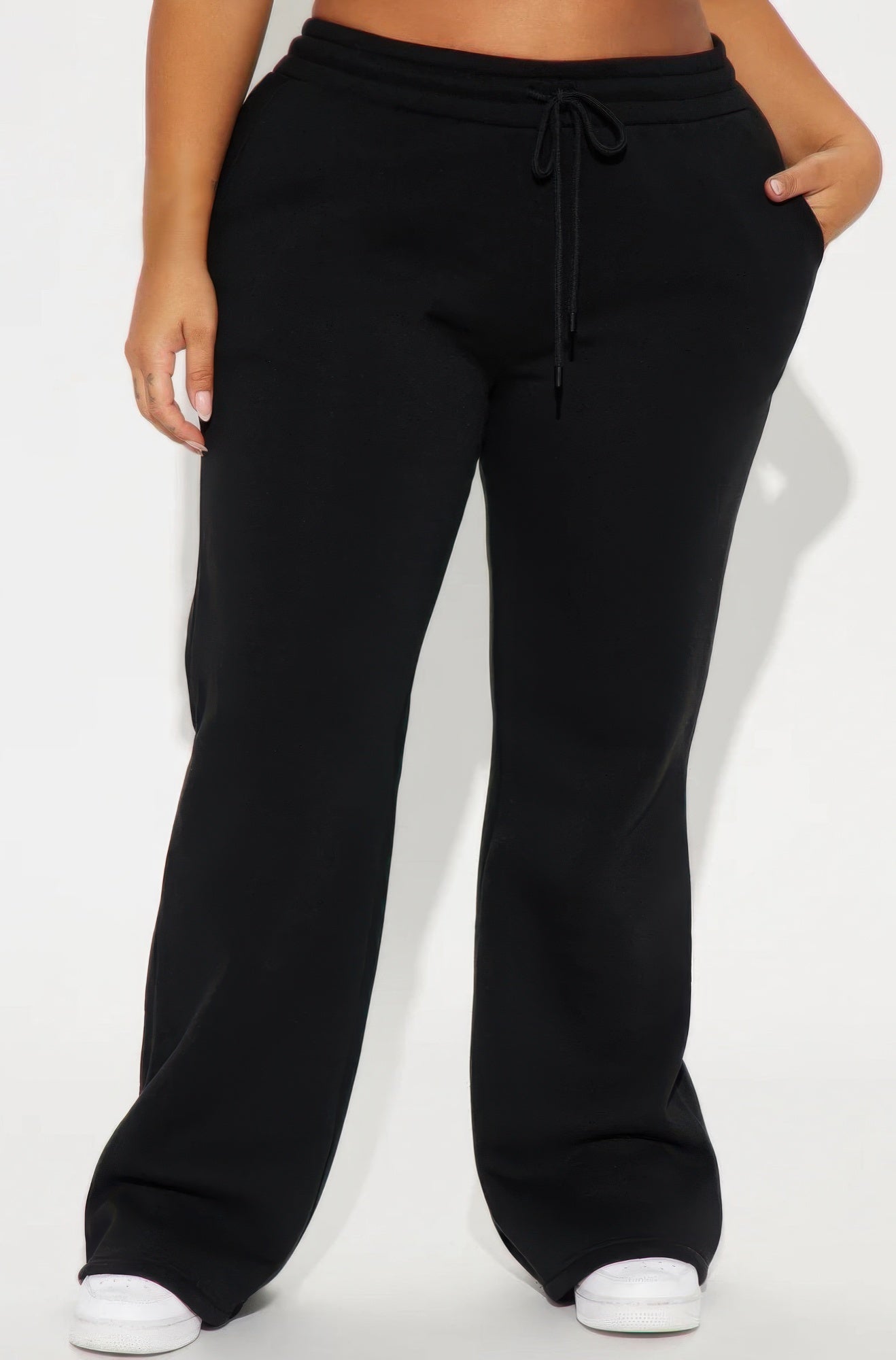 Black lounge flare pants by Golden Heir with a relaxed fit and stylish design, ideal for casual and comfortable wear.