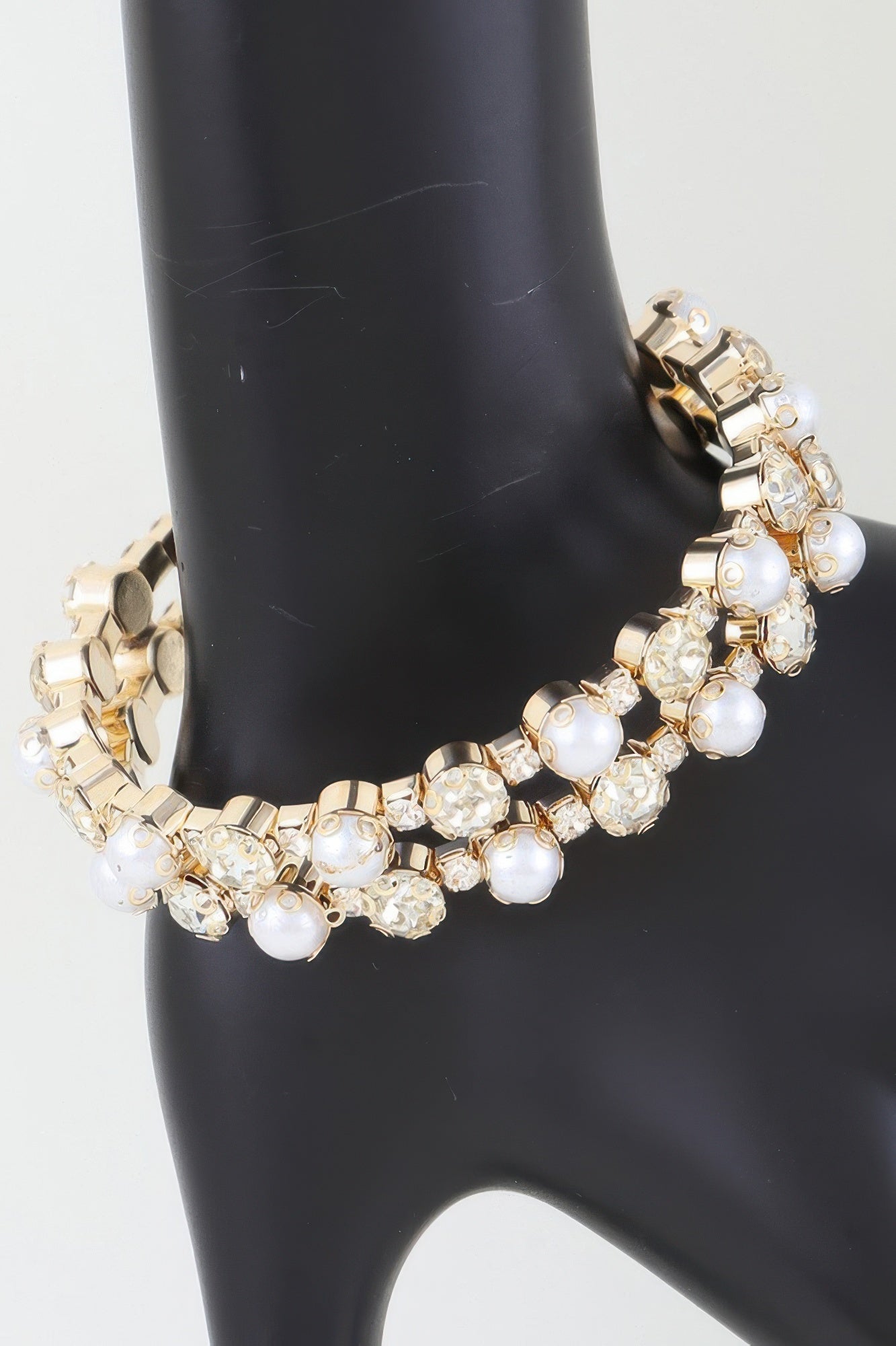 Golden Heir double pearled cuff bracelet with silver and golden pearls, showcasing elegant design and intricate craftsmanship.