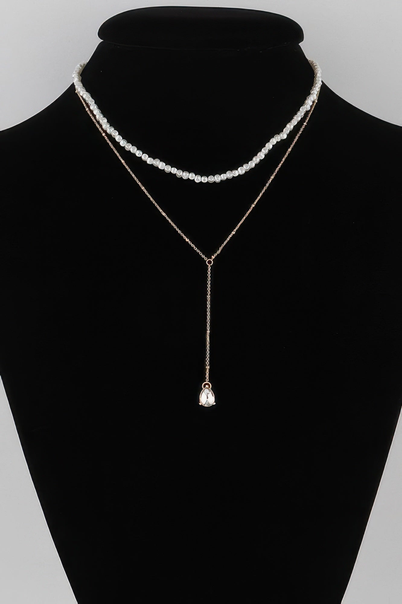Golden Heir Aurelia double teardrop pearl necklace featuring cream and gold pearls, elegant jewelry for special occasions.