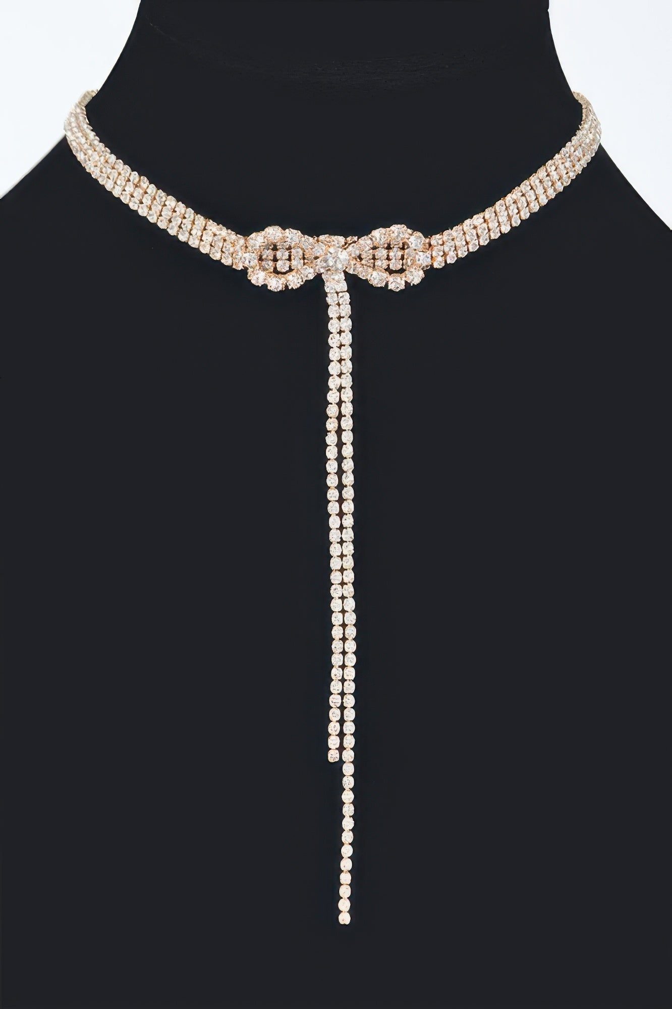 Golden Heir Elowen bow-tie rhinestone choker with clear and gold stones, 10.5-inch statement jewelry piece.