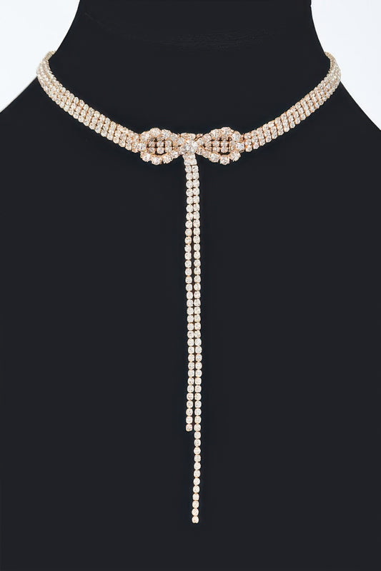 Golden Heir Elowen bow-tie rhinestone choker with clear and gold stones, 10.5-inch statement jewelry piece.