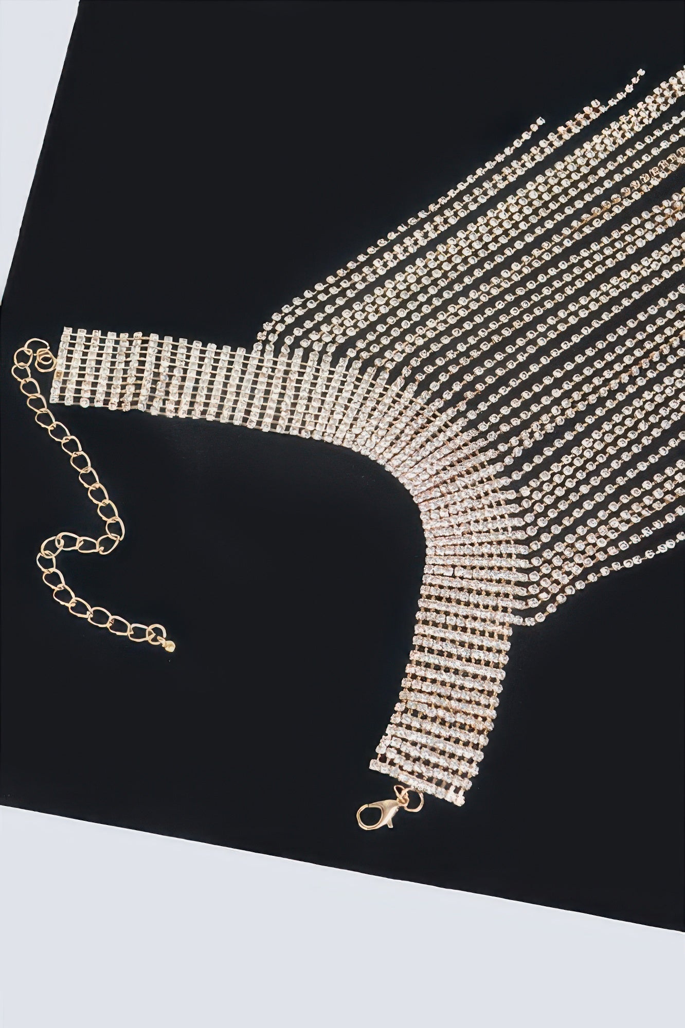 Golden Heir Astraea rhinestone tassel choker with shimmering rhinestones and gold-toned design, stylish jewelry for elegant occasions.